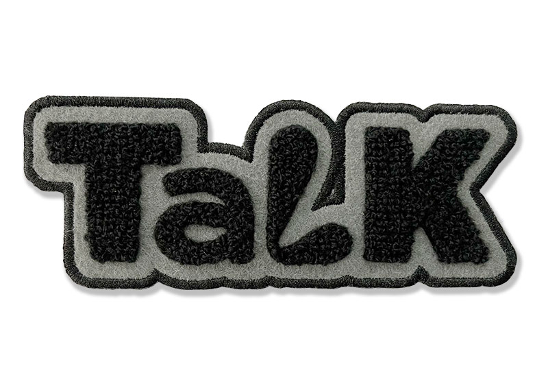 Chenille patch with a raised, textured finish